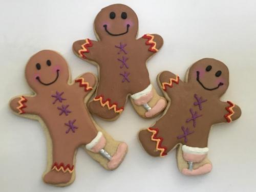 Trio of amputee gingerbread men with prosthetics