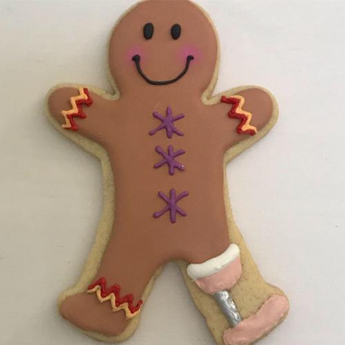 Close up of gingerbread man with prosthetic leg 2